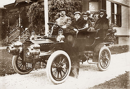 The Lewis family in a 1905 Cadillac Model F