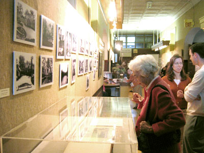 Society Member Janet Thorpe looks at the photo exhibit