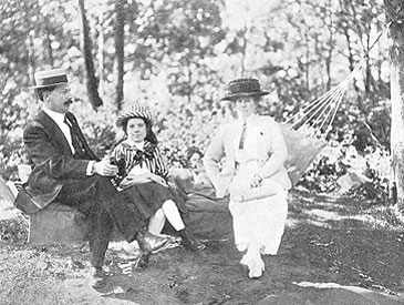 Mr. Denlap with wife and daughter in the hammock