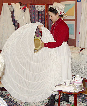 A series of hoops encased in a slip known as a crinoline supported the weight and fullness of a skirt