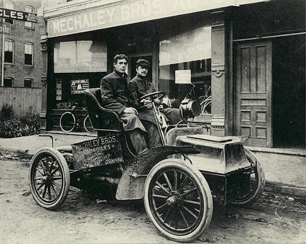Joseph Mechaley on the left, with an unidentified gentleman, in a 1904 Cadillac