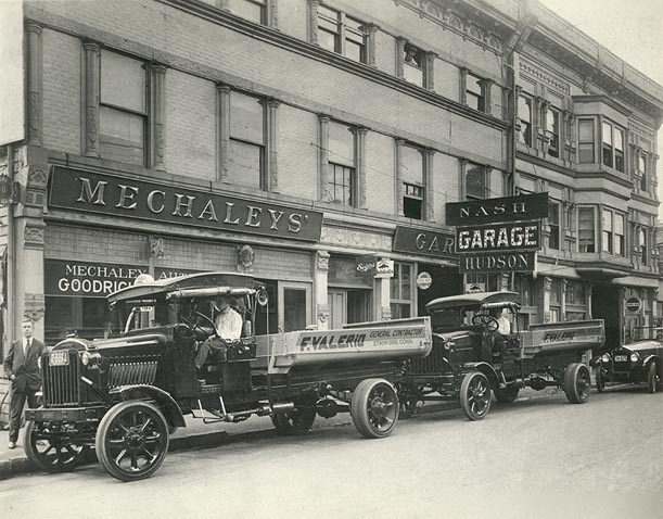 Cars lining up in front of Mechaleys for Automobile Show at the Armory, circa 1920