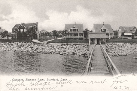 Uncancelled postcard of summer cottages dated January 6, no year given, with inscription.